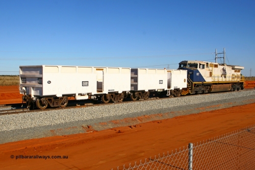080525 2349r
Boodarie, FMG General Electric Dash 9-44CW unit 007 shunts compressor waggon set 9003-9004 onto the empty waggon line at the 4.400 km, which is the switch for the balloon unloading loop at the entrance to the Herb Elliot Port facility. 25th May 2008.
Keywords: FMG-007;GE;Dash-9-44CW;58184;