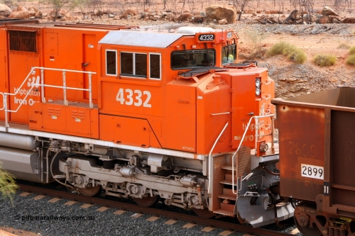 081225 0720r
Turner North on Christmas Day 2008 sees the first BHP Billiton Electro-Motive built SD70ACe 'Pumpkin' unit 4332 serial 20066862-061, originally built for BNSF, to be fitted out as a lead unit. This cab shot shows some of the external modifications to allow it to lead. In-fill step covers, second handrail, second (tropical) roof, bifurcation of main air line, AM/FM CD player-radio and removal of sun shades.
Keywords: 4332;Electro-Motive-London-Ontario;EMD;SD70ACe;20066862-061;BNSF-9190;