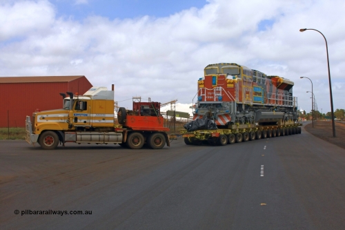 090114 0904
Port Hedland, the last of the current order at the time and last off the ship, Electro-Motive built SD70ACe/LC loco 4346 serial 20078915-013 swings off Gilbert Street and into Nelson Point via Gate 9 on the 14th January 2009.
Keywords: 4346;Electro-Motive;EMD;SD70ACe/LC;20078915-013;