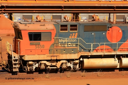 100508 8226r
Nelson Point, BHP Billiton's Goninan GE CM40-8M unit 5650 'Yawata' serial 8412-07 / 93-141 rebuilt from AE Goodwin M636C ALCo 5481, cab side shot shows Hi-Ad bogie, modified handrail and black side loco numbers, only 5639 and 5650 carried black numbers till retirement with the original repaint 5632 having its black numbers changed to white. 8th May 2010.
Keywords: 5650;Goninan;GE;CM40-8M;8412-07/93-141;rebuild;AE-Goodwin;ALCo;M636C;5481;G6061-2