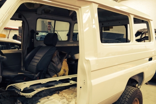140603 0698r
Here's the Troopy at the panel shop with a complete new LHS panel, that's the new fender and mudguard inside the car. June 2014.
