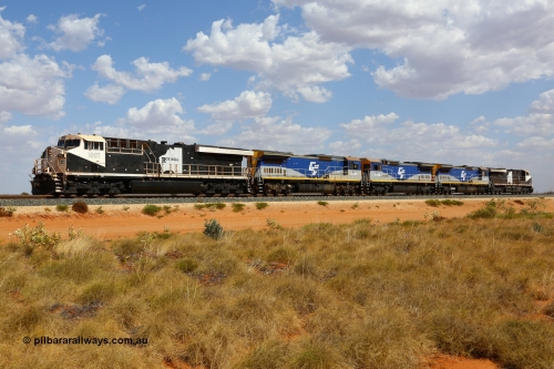 171222 1129
Ballast Spur A, Roy Hill's General Electric built ES44ACi units RHA 1007 serial 62579 and RHA 1020 cover the three CFCLA Goninan ALCo to GE rebuild units CM40-8M CD 4301, CD 4302 and CD 43031 during mainline load testing of the three lease units. 22nd December 2017.
Keywords: RHA-class;RHA1007;GE;ES44ACi;62579;